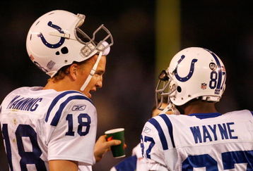 SAN DIEGO - JANUARY 03:  Wide receiver Reggie Wayne #87 of the Indianapolis Colts talks with quaterback Peyton Manning #18 during the AFC Wild Card Game against the San Diego Chargers on January 3, 2009 at Qualcomm Stadium in San Diego, California.  (Photo by Harry How/Getty Images)