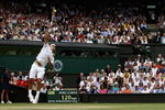 WIMBLEDON, ENGLAND - JULY 03:  Roger Federer of Switzerland serves during the men's singles semi final match against Tommy Haas of Germany on Day Eleven of the Wimbledon Lawn Tennis Championships at the All England Lawn Tennis and Croquet Club on July 3, 2009 in London, England.  (Photo by Hamish Blair/Getty Images)