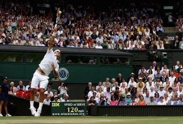 WIMBLEDON, ENGLAND - JULY 03:  Roger Federer of Switzerland serves during the men's singles semi final match against Tommy Haas of Germany on Day Eleven of the Wimbledon Lawn Tennis Championships at the All England Lawn Tennis and Croquet Club on July 3, 2009 in London, England.  (Photo by Hamish Blair/Getty Images)