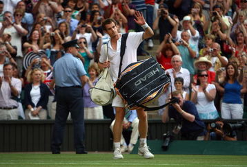 WIMBLEDON, ENGLAND - JULY 03:  Andy Murray of Great Britain waves to the crowd after defeat during the men's singles semi final match against Andy Roddick of USA on Day Eleven of the Wimbledon Lawn Tennis Championships at the All England Lawn Tennis and Croquet Club on July 3, 2009 in London, England.  (Photo by Julian Finney/Getty Images)