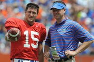 GAINESVILLE, FL - APRIL 18: Quarterback Tim Tebow #15 of the University of Florida talks with quarterbacks coach Scott Loeffler  during the spring football Orange and Blue game April 18, 2009 at Ben Hill Griffin Stadium in Gainesville, Florida.  (Photo by Al Messerschmidt/Getty Images)
