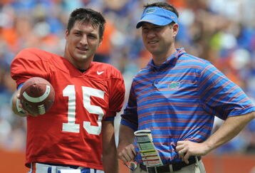 GAINESVILLE, FL - APRIL 18: Quarterback Tim Tebow #15 of the University of Florida talks with quarterbacks coach Scott Loeffler  during the spring football Orange and Blue game April 18, 2009 at Ben Hill Griffin Stadium in Gainesville, Florida.  (Photo by Al Messerschmidt/Getty Images)