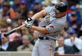 CHICAGO - MAY 27: Brandon Moss #44 of the Pittsburgh Pirates hits the ball against the Chicago Cubs on May 27, 2009 at Wrigley Field in Chicago, Illinois. The Cubs defeated the Pirates 5-2. (Photo by Jonathan Daniel/Getty Images)