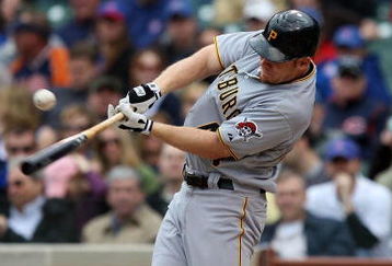 CHICAGO - MAY 27: Brandon Moss #44 of the Pittsburgh Pirates hits the ball against the Chicago Cubs on May 27, 2009 at Wrigley Field in Chicago, Illinois. The Cubs defeated the Pirates 5-2. (Photo by Jonathan Daniel/Getty Images)