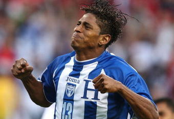 CHICAGO - JUNE 06: Carlos Costly #13 of Honduras celebrates his goal against the United States during a FIFA 2010 World Cup Qualifying match on June 6, 2009 at Soldier Field in Chicago, Illinois. The United States defeated Honduras 2-1. (Photo by Jonathan Daniel/Getty Images)