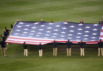 SEATTLE - APRIL 14:  A general view of the American Flag taken during the nationa anthem before the Opening Day game between the Seattle Mariners and the Los Angeles Angels of Anaheim on April 14, 2009 at Safeco Field in Seattle, Washington. (Photo by: Otto Greule Jr/Getty Images)