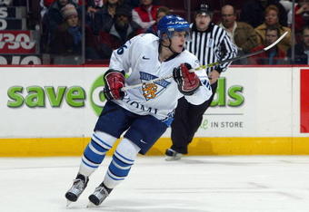 VANCOUVER, CANADA - JANUARY 2:  Leo Komarov #16 of Team Finland skates against Team Sweden during their World Junior Hockey Championships quarterfinal game at General Motors Place on January 2, 2006 in Vancouver, British Columbia, Canada.  Team Finland defeated team Sweden 1-0 to advance to the semifinal round. (Photo By Dave Sandford/Getty Images)