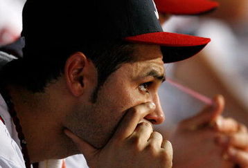 ATLANTA - JUNE 26:  Pitcher Mike Gonzalez #51 of the Atlanta Braves looks on from the dugout in the bottom of the ninth inning against the Boston Red Sox at Turner Field on June 26, 2009 in Atlanta, Georgia.  (Photo by Kevin C. Cox/Getty Images)