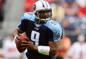 HOUSTON - OCTOBER 9:  Quarterback Steve McNair #9 of the Tennessee Titans rolls out against the Houston Texans at Reliant Stadium on October 9, 2005 in Houston, Texas. The Titans defeated the Texans 34-20. (Photo by Jeff Gross/Getty Images)