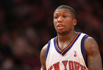 NEW YORK - MARCH 07:  Nate Robinson #4 of the New York Knicks looks on against the Charlotte Bobcats on March 7, 2009 at Madison Square Garden in New York City. NOTE TO USER: User expressly acknowledges and agrees that, by downloading and or using this photograph, User is consenting to the terms and conditions of the Getty Images License Agreement.  (Photo by Nick Laham/Getty Images)