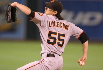OAKLAND, CA - JUNE 23:  Tim Lincecum #55 of the San Francisco Giants pitches against the Oakland Athletics during a Major League Baseball game on June 23, 2009 at the Oakland Coliseum in Oakland, California.  (Photo by Jed Jacobsohn/Getty Images)