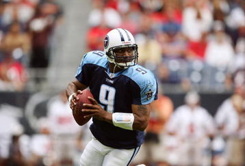 HOUSTON - OCTOBER 9:  Quarterback Steve McNair #9 of the Tennessee Titans rolls out against the Houston Texans at Reliant Stadium on October 9, 2005 in Houston, Texas. The Titans defeated the Texans 34-20. (Photo by Jeff Gross/Getty Images)