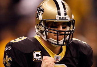 NEW ORLEANS - DECEMBER 28:  Quarterback Drew Brees #9 of the New Orleans Saints pumps his fist during the game against the Carolina Panthers on December 28, 2008 at the Superdome in New Orleans, Louisiana.  (Photo by Chris Graythen/Getty Images)