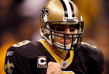 NEW ORLEANS - DECEMBER 28:  Quarterback Drew Brees #9 of the New Orleans Saints pumps his fist during the game against the Carolina Panthers on December 28, 2008 at the Superdome in New Orleans, Louisiana.  (Photo by Chris Graythen/Getty Images)