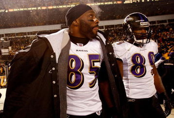 PITTSBURGH - JANUARY 18:  (L-R) Derrick Mason #85 and Mark Clayton #89 of the Baltimore Ravens stand on the field dejected after their 23-14 loss against the Pittsburgh Steelers during the AFC Championship game on January 18, 2009 at Heinz Field in Pittsburgh, Pennsylvania.  (Photo by Streeter Lecka/Getty Images)