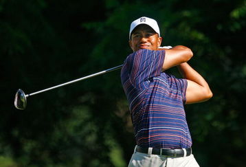 BETHESDA, MD - JULY 03:  Tiger Woods watches his tee shot on the 16th hole during the second round of the AT&T National at the Congressional Country Club on July 3, 2009 in Bethesda, Maryland.  (Photo by Scott Halleran/Getty Images)