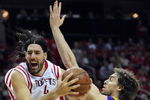 HOUSTON - MAY 14:  Forward Luis Scola #4 of the Houston Rockets drives the hoop against Pau Gasol #16 of the Los Angeles Lakers in Game Six of the Western Conference Semifinals during the 2009 NBA Playoffs at Toyota Center on May 14, 2009 in Houston, Texas. NOTE TO USER: User expressly acknowledges and agrees that, by downloading and or using this photograph, User is consenting to the terms and conditions of the Getty Images License Agreement.  (Photo by Ronald Martinez/Getty Images)
