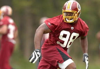 ASHBURN, VA - MAY 1:  Brian Orakpo #98, the Washington Redskins first round draft pick, runs through drills during minicamp on May 1, 2009 at Redskins Park in Ashurn, Virginia.   (Photo by Mitchell Layton/Getty Images)