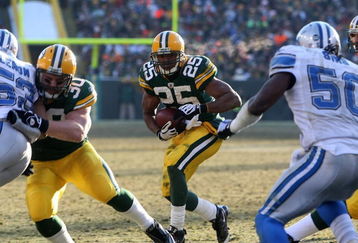 GREEN BAY, WI - DECEMBER 28: Ryan Grant #25 of the Green Bay Packers looks for running room against the Detroit Lions on December 28, 2008 at Lambeau Field in Green Bay, Wisconsin. The Packers defeated the Lions 31-21. (Photo by Jonathan Daniel/Getty Images)
