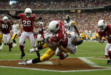 GLENDALE, AZ - SEPTEMBER 30:  Adrian Wilson #24 of the Arizona Cardinals is tackled in the endzone by Heath Miller #83 of the Pittsburgh Steelers after making an interception for a touchback at University of Phoenix Stadium September 30, 2007 in Glendale, Arizona.  (Photo by Jonathan Ferrey/Getty Images)