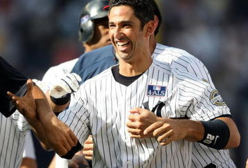 NEW YORK - JULY 04:  Jorge Posada #20 of the New York Yankees celebrates hitting a game winning single in the 12th inning against the Toronto Blue Jays on July 4, 2009 at Yankee Stadium in the Bronx borough of New York City.  (Photo by Nick Laham/Getty Images)