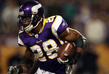 MINNEAPOLIS - JANUARY 4:   Adrian Peterson #28 of the Minnesota Vikings carries the ball in the first half against the Philadelphia Eagles during the NFC Wild Card playoff game on January 4,2009 at the Hubert H. Humphrey Metrodome in Minneapolis, Minnesota. (Photo by Elsa/Getty Images)