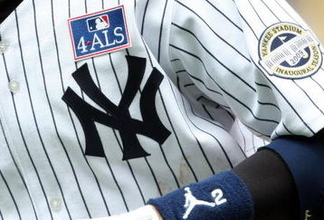 NEW YORK - JULY 04: The ALS badge is seen on the jersey of Derek Jeter #2 of the New York Yankees against the Toronto Blue Jays on July 4, 2009 at Yankee Stadium in the Bronx borough of New York City.  (Photo by Nick Laham/Getty Images)