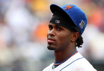 NEW YORK - MAY 09:  Jose Reyes #7 of the New York Mets looks on against the Pittsburgh Pirates on May 9, 2009 at Citi Field in the Flushing neighborhood of the Queens borough of New York City. The Mets defeated the Pirates 10-1.  (Photo by Jim McIsaac/Getty Images)