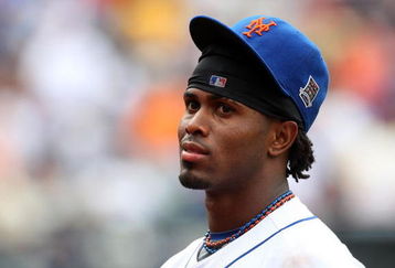 NEW YORK - MAY 09:  Jose Reyes #7 of the New York Mets looks on against the Pittsburgh Pirates on May 9, 2009 at Citi Field in the Flushing neighborhood of the Queens borough of New York City. The Mets defeated the Pirates 10-1.  (Photo by Jim McIsaac/Getty Images)