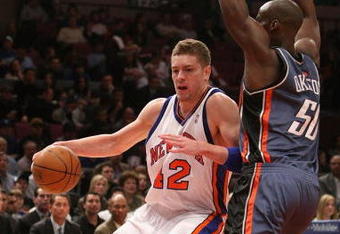 NEW YORK - MARCH 07:  David Lee #42 of the New York Knicks drives to the basket against the Charlotte Bobcats on March 7, 2009 at Madison Square Garden in New York City. NOTE TO USER: User expressly acknowledges and agrees that, by downloading and or using this photograph, User is consenting to the terms and conditions of the Getty Images License Agreement.  (Photo by Nick Laham/Getty Images)