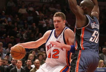 NEW YORK - MARCH 07:  David Lee #42 of the New York Knicks drives to the basket against the Charlotte Bobcats on March 7, 2009 at Madison Square Garden in New York City. NOTE TO USER: User expressly acknowledges and agrees that, by downloading and or using this photograph, User is consenting to the terms and conditions of the Getty Images License Agreement.  (Photo by Nick Laham/Getty Images)