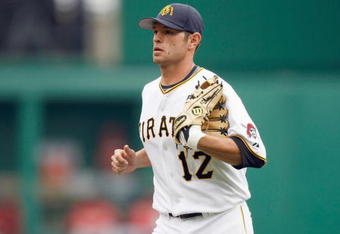PITTSBURGH - APRIL 13: Freddy Sanchez #12 of the Pittsburgh Pirates gets ready infield during the Opening Day game against the Houston Astros at PNC Park on April 13, 2009 in Pittsburgh, Pennsylvania.  (Photo by: Gregory Shamus/Getty Images)