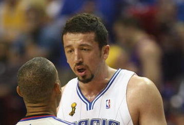 ORLANDO, FL - JUNE 14:  Hedo Turkoglu #15 of the Orlando Magic talks with referee Dan Crawford #43 during Game Five of the 2009 NBA Finals against the Los Angeles Lakers on June 14, 2009 at Amway Arena in Orlando, Florida. The Lakers won 99-86. NOTE TO USER:  User expressly acknowledges and agrees that, by downloading and or using this photograph, User is consenting to the terms and conditions of the Getty Images License Agreement. (Photo by Elsa/Getty Images) 