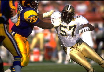 3 NOV 1991:  NEW ORLEANS SAINTS LINEBACKER RICKEY JACKSON #57 TRIES TO AVOID THE BLOCK OF LOS ANGELES RAMS OFFENSIVE LINEMAN JACKIE SLATER #78 DURING THE SAINTS 24-17 WIN AT ANAHEIM STADIUM IN ANAHEIM, CALIFORNIA.