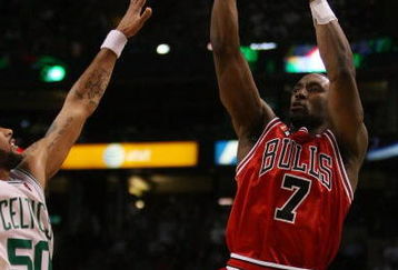BOSTON - MAY 02:  Ben Gordon #7 of the Chicago Bulls takes a shot as Eddie House #50 of the Boston Celtics defends in Game Seven of the Eastern Conference Quarterfinals during the 2009 NBA Playoffs at TD Banknorth Garden on May 2, 2009 in Boston, Massachusetts. The Celtics defeated the Bulls 109-99. NOTE TO USER: User expressly acknowledges and agrees that, by downloading and or using this photograph, User is consenting to the terms and conditions of the Getty Images License Agreement.  (Photo by Elsa/Getty Images)