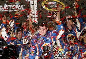 DAYTONA BEACH, FL - JULY 04:  Tony Stewart, driver of the #14 Burger King Chevrolet celebrates in victory lane after winning the NASCAR Sprint Cup Series 51st Annual Coke Zero 400 at Daytona International Speedway on July 4, 2009 in Daytona Beach, Florida.  (Photo by Jerry Markland/Getty Images for NASCAR)