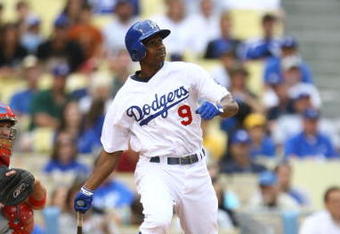 LOS ANGELES, CA - JUNE 06:  Juan Pierre #9 of the Los Angeles Dodgers bats against the Philadelphia Phillies at Dodger Stadium on June 6, 2009 in Los Angeles, California. The Dodgers defeated the Phillies 3-2 in 12 innings.  (Photo by Jeff Gross/Getty Images)