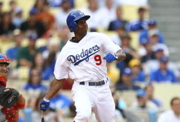 LOS ANGELES, CA - JUNE 06:  Juan Pierre #9 of the Los Angeles Dodgers bats against the Philadelphia Phillies at Dodger Stadium on June 6, 2009 in Los Angeles, California. The Dodgers defeated the Phillies 3-2 in 12 innings.  (Photo by Jeff Gross/Getty Images)