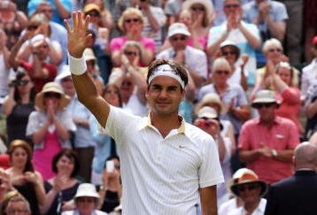 WIMBLEDON, ENGLAND - JULY 03:  Roger Federer of Switzerland waves to the crowd after victory during the men's singles semi final match against Tommy Haas of Germany on Day Eleven of the Wimbledon Lawn Tennis Championships at the All England Lawn Tennis and Croquet Club on July 3, 2009 in London, England.  (Photo by Hamish Blair/Getty Images)