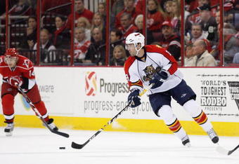 RALEIGH, NC - DECEMBER 18:  Radek Dvorak #14 of the Florida Panthers handles the puck during the game against the Carolina Hurricanes on December 18, 2008 at RBC Center in Raleigh, North Carolina.  (Photo by Kevin C. Cox/Getty Images)