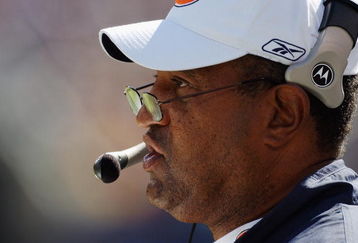 CHICAGO - OCTOBER 5:  Defensive coordinator Greg Blache of the Chicago Bears watches the game against the Oakland Raiders at Soldier Field on October 5, 2003 in Chicago, Illinois. The Bears defeated the Raiders 24-21. (Photo by Jonathan Daniel/Getty Images)