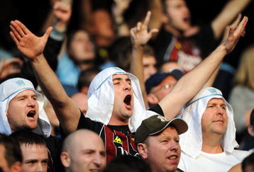 MANCHESTER, UNITED KINGDOM - SEPTEMBER 13:  Manchester City fans show their support during the Premier League match between Manchester City and Chelsea at The City of Manchester Stadium on September 13, 2008 in Manchester, England.  (Photo by Shaun Botterill/Getty Images)