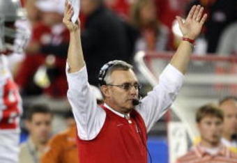 GLENDALE, AZ - JANUARY 05:  Head coach Jim Tressel of the Ohio State Buckeyes reacts during the Tostitos Fiesta Bowl Game against the Texas Longhorns on January 5, 2009 at University of Phoenix Stadium in Glendale, Arizona.   The Longhorns defeated the Buckeyes 24-21.  (Photo by Jed Jacobsohn/Getty Images)