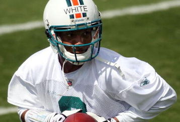 DAVIE, FL - MAY 02:  Rookie quarterback Pat White  #6 of the Miami Dolphins drops back to pass during mini camp on May 2, 2009 at the Miami Dolphins Training facility in Davie, Florida.  (Photo by Marc Serota/Getty Images)