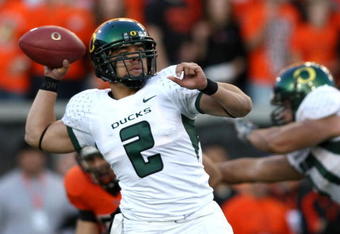 CORVALLIS, OR - NOVEMBER 29: Quarterback Jeremiah Masoli #2  of the Oregon Ducks throws a pass against the Oregon State Beavers at Reser Stadium on November 29, 2008 in Corvalis, Oregon.  (Photo by Jonathan Ferrey/Getty Images)