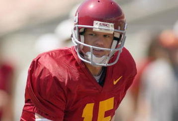 LOS ANGELES, CA - APRIL 25: Quarterback Aaron Corp #15 of the USC Trojans at the line during the spring game on April 25, 2009 at the Los Angeles Memorial Coliseum in Los Angeles, California.  The cardinal team won 16-10.  (Photo by Jeff Golden/Getty Images)