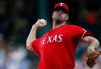 ARLINGTON, TX - JULY 1:  Pitcher Kevin Millwood #33 of the Texas Rangers throws against the Los Angeles Angels of Anaheim at Rangers Ballpark July 1, 2009 in Arlington, Texas.  (Photo by Ronald Martinez/Getty Images)