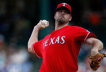 ARLINGTON, TX - JULY 1:  Pitcher Kevin Millwood #33 of the Texas Rangers throws against the Los Angeles Angels of Anaheim at Rangers Ballpark July 1, 2009 in Arlington, Texas.  (Photo by Ronald Martinez/Getty Images)