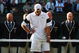 WIMBLEDON, ENGLAND - JULY 05:  Andy Roddick of USA looks despondent after defeat during the men's singles final match against Roger Federer of Switzerland on Day Thirteen of the Wimbledon Lawn Tennis Championships at the All England Lawn Tennis and Croquet Club on July 5, 2009 in London, England. Federer won 5-7, 7-6, 7-6, 3-6, 16-14.  (Photo by Clive Brunskill/Getty Images)