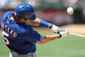 OAKLAND, CA - MAY 07:  Ian Kinsler #5 of the Texas Rangers bats against the Oakland Athletics during a Major League Baseball game on May 7, 2009 at the Oakland Coliseum in Oakland, California.  (Photo by Jed Jacobsohn/Getty Images)